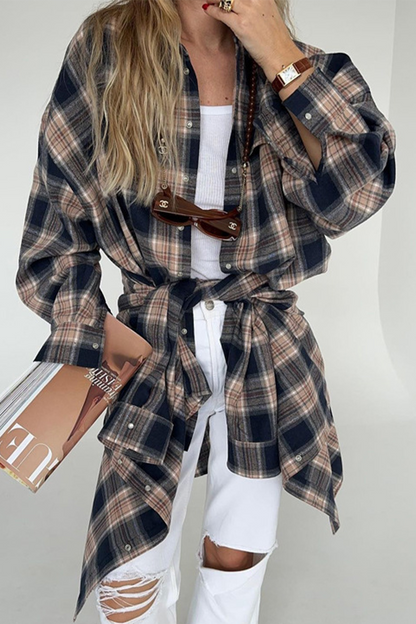 Flannel shirt tied at waist with cargo pants